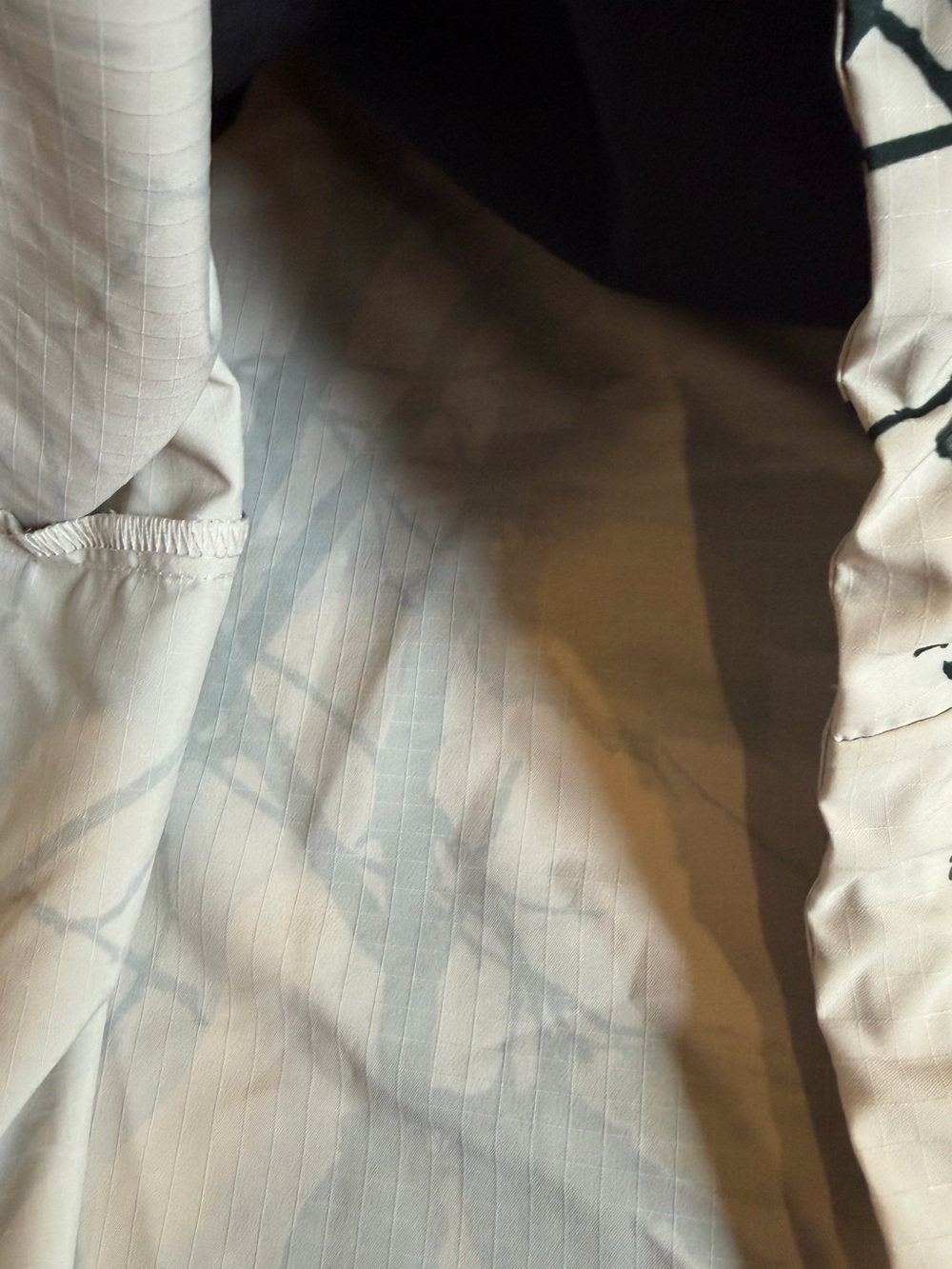 New Balance Cream Floral-Print Wind Breaker Jacket with Black Sleeve Panels - Picture 7 of 8